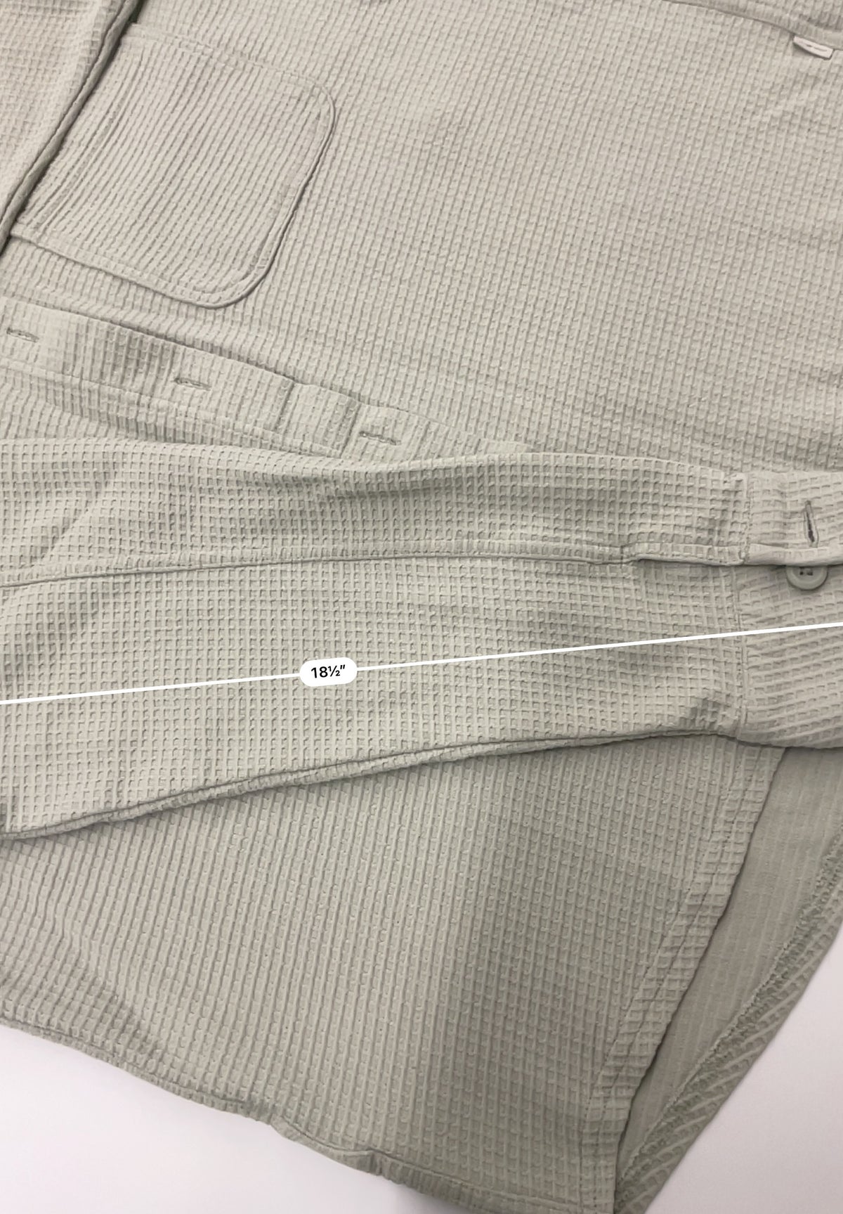 Eddie Bauer women's waffle knit button-down shirt in a light sage green color.
