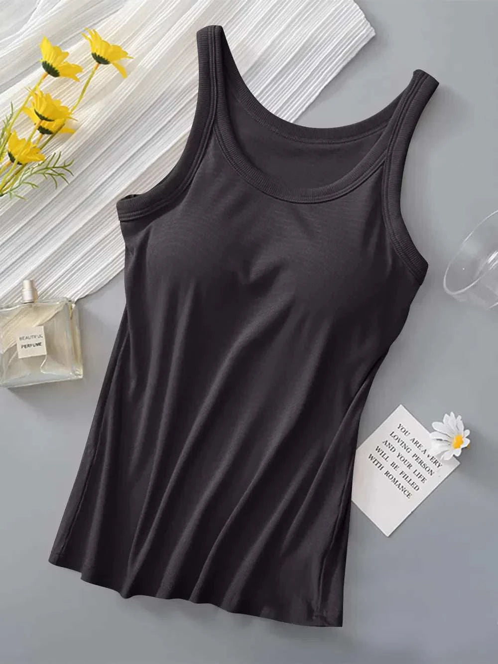 Black round neck tank top with built-in bra, made of 95% viscose and 5% spandex, moderate stretch, basic style, machine washable