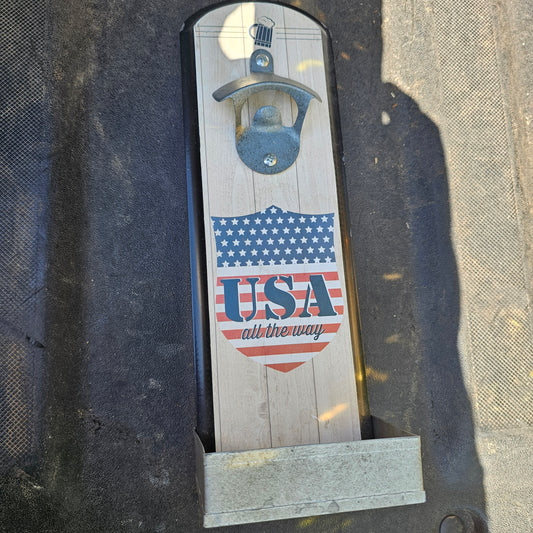 Wall-mounted bottle opener with a cap catcher
