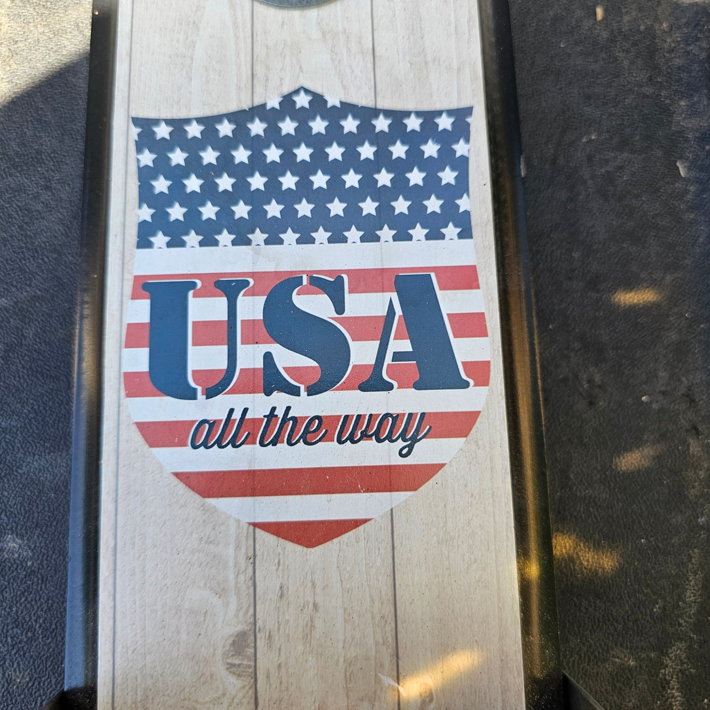 Wall-mounted bottle opener with a cap catcher