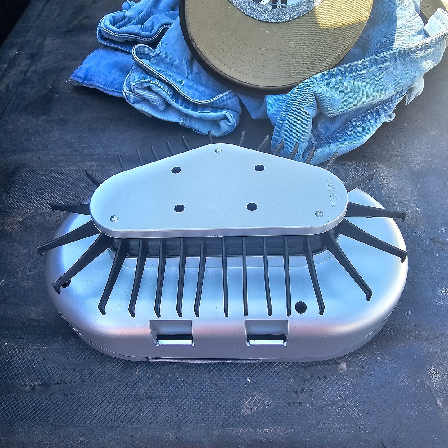 Rotating tie holder organizer with multiple prongs for neckties and belts in a compact, durable design