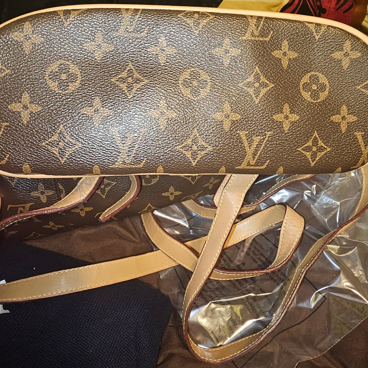 Brown Monogram Drawstring Backpack with Front Zip Pocket