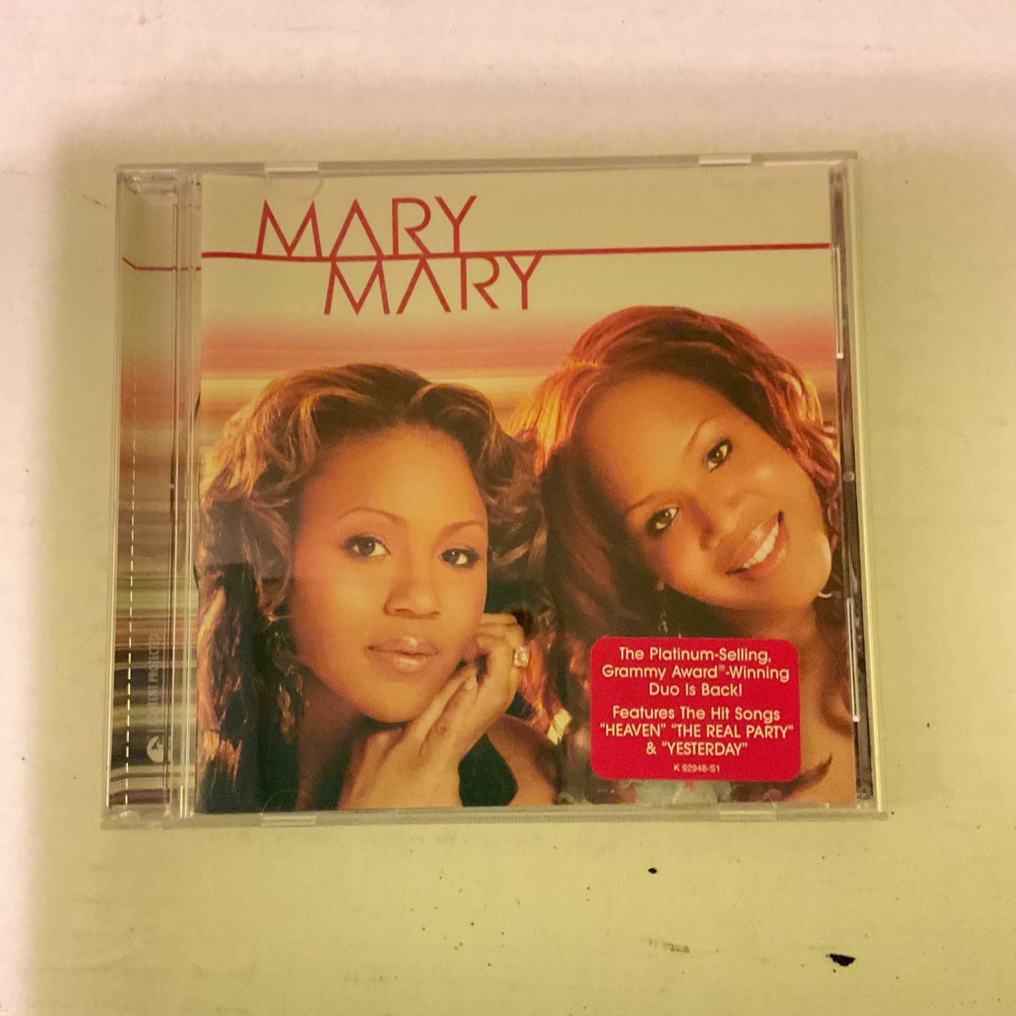 Mary Mary CD album cover featuring two women smiling with red text and Grammy Award sticker