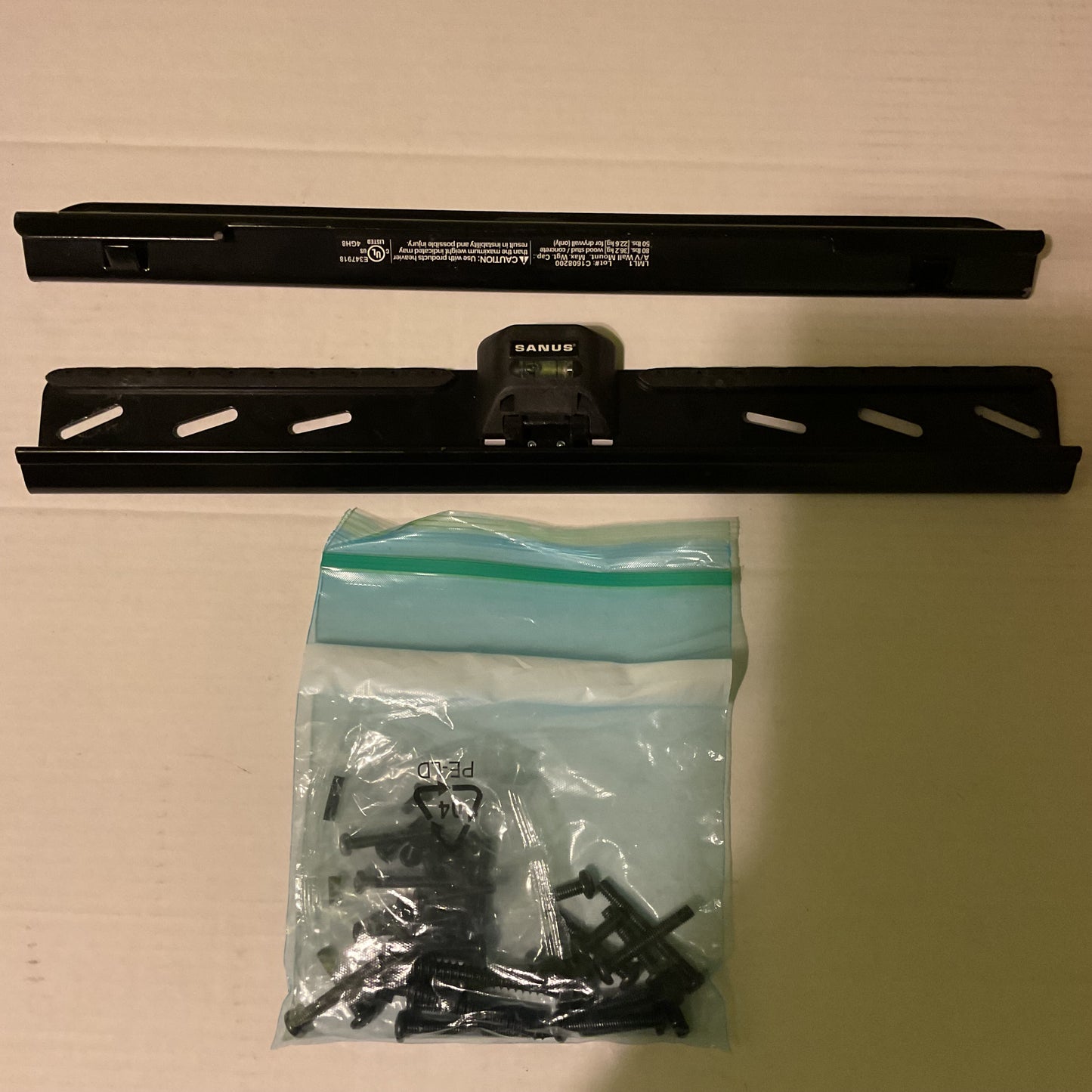 Sanus SimplySafe Fixed-Position TV Wall Mount (Model #LML1-B1), which is designed for TVs between 22 and 55 inches and does not require studs for installation