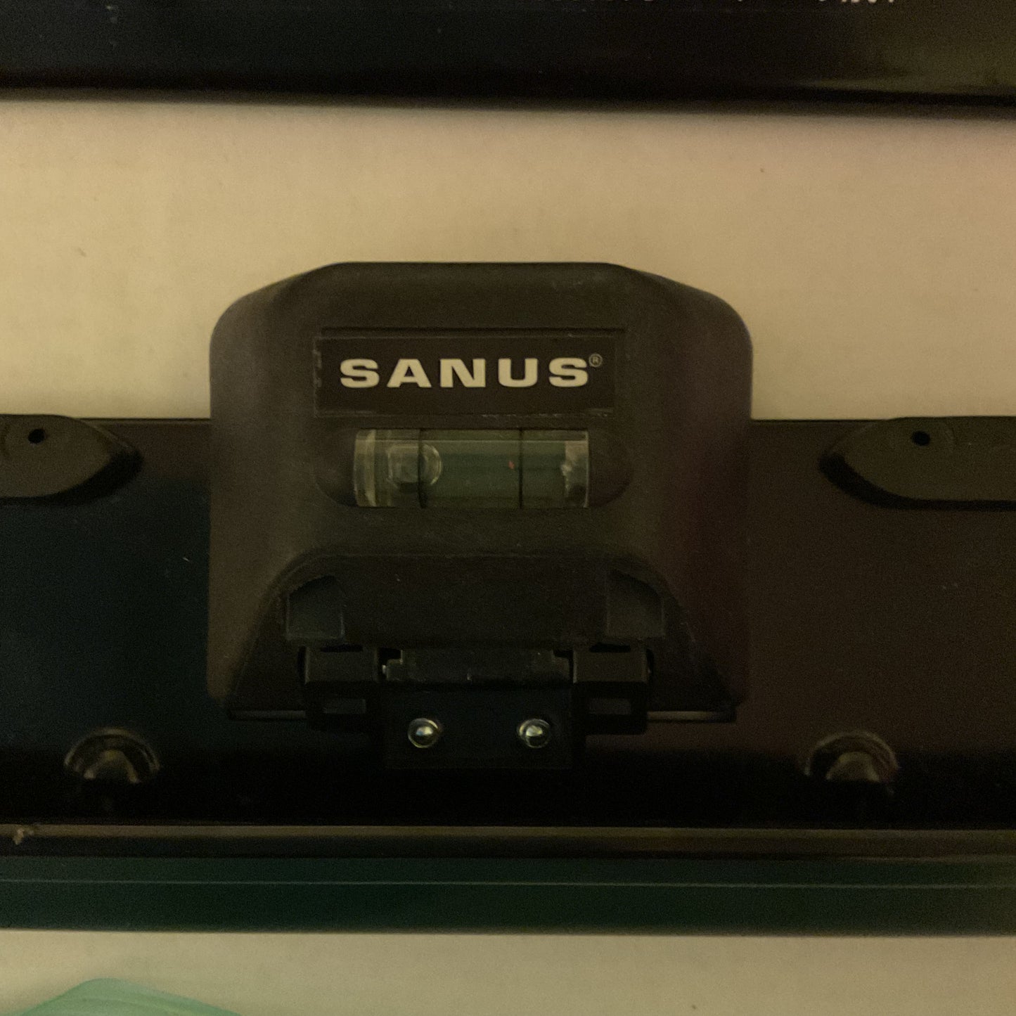 Sanus SimplySafe Fixed-Position TV Wall Mount (Model #LML1-B1), which is designed for TVs between 22 and 55 inches and does not require studs for installation