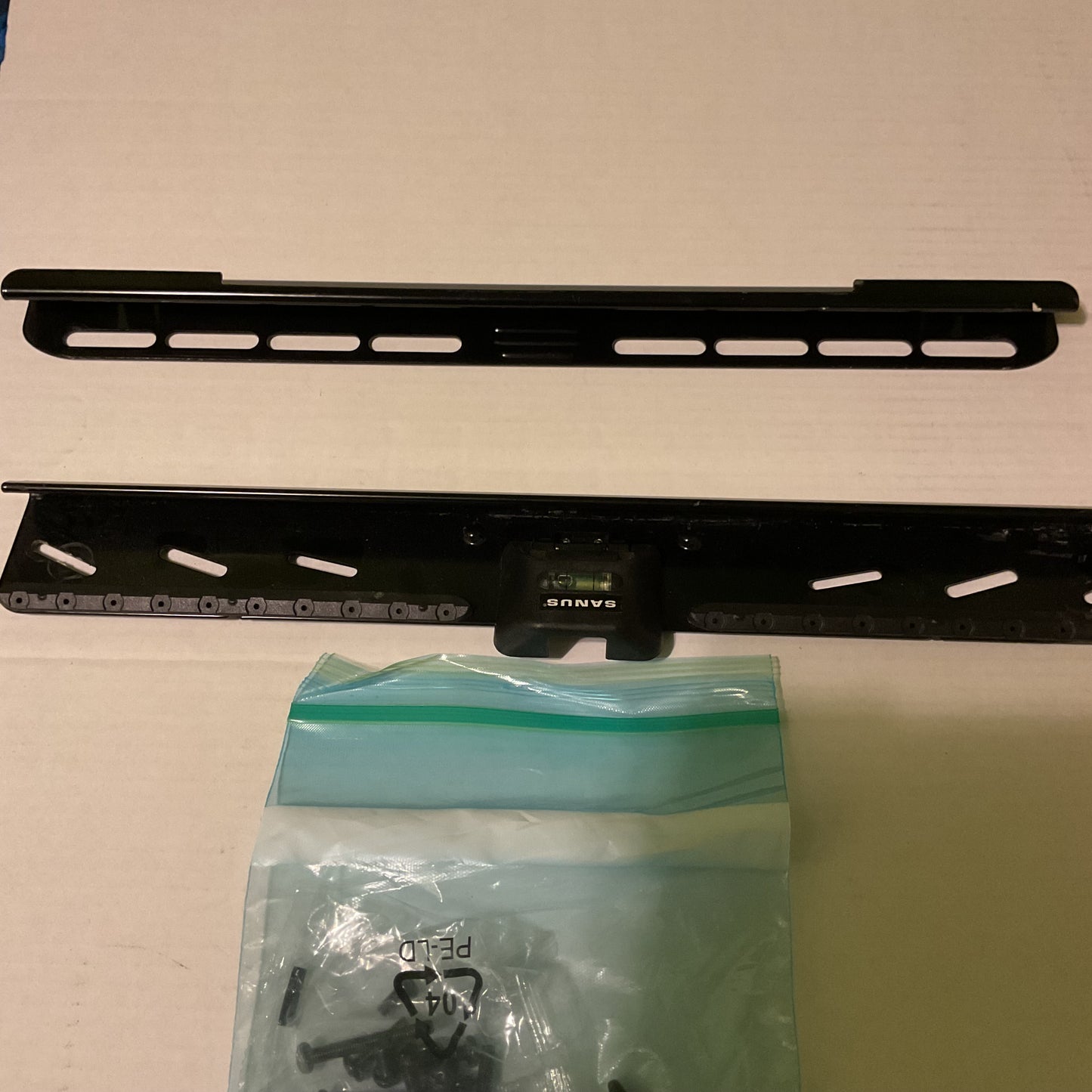 Sanus SimplySafe Fixed-Position TV Wall Mount (Model #LML1-B1), which is designed for TVs between 22 and 55 inches and does not require studs for installation