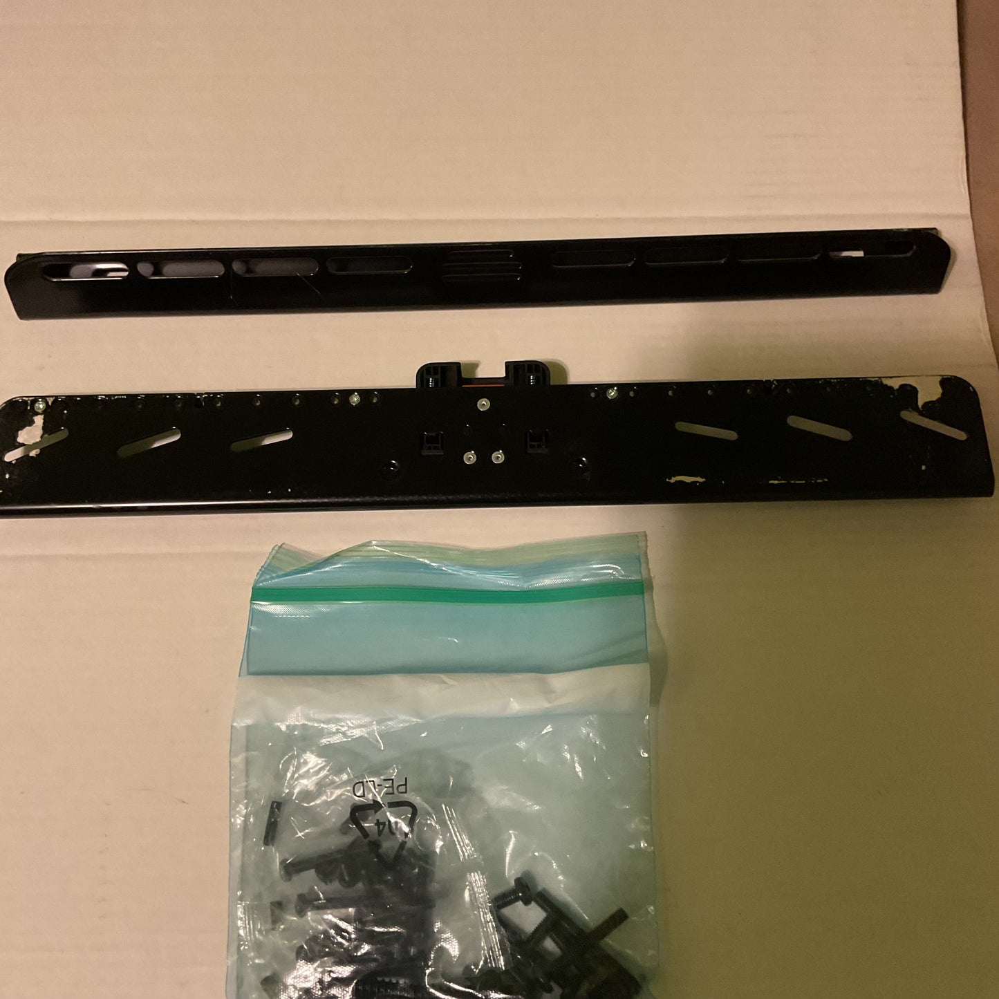 Sanus SimplySafe Fixed-Position TV Wall Mount (Model #LML1-B1), which is designed for TVs between 22 and 55 inches and does not require studs for installation