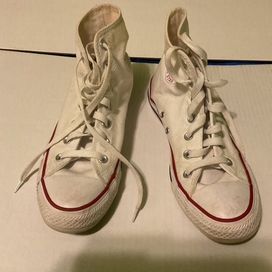 Worn white Converse Chuck Taylor All Star high-top sneakers for men and women