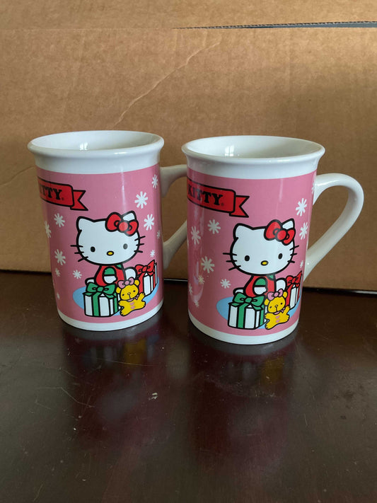Set of two Hello Kitty pink mugs with presents and teddy bear design on ceramic cups