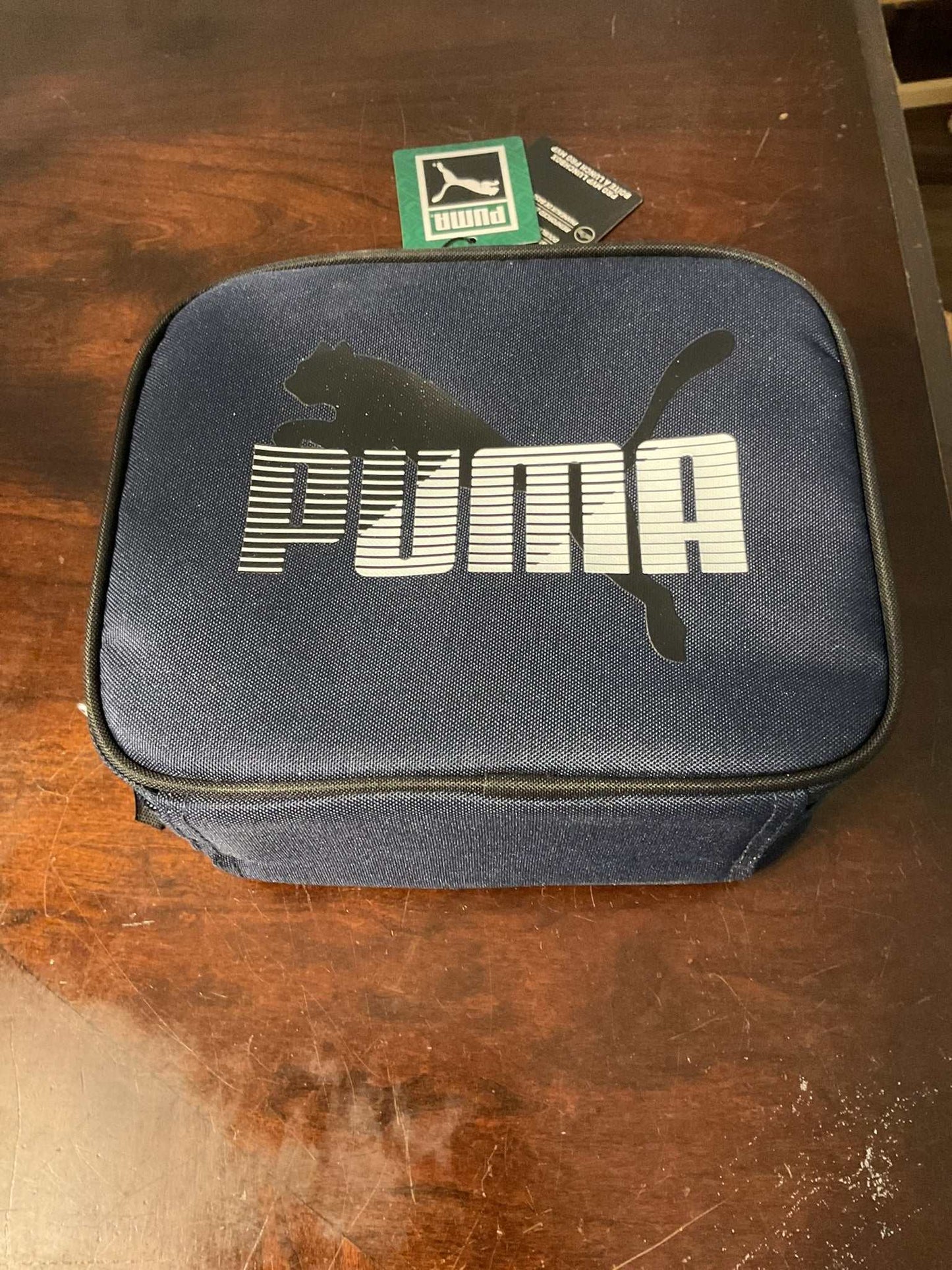 Puma navy lunch box with bold logo design and durable material for everyday use