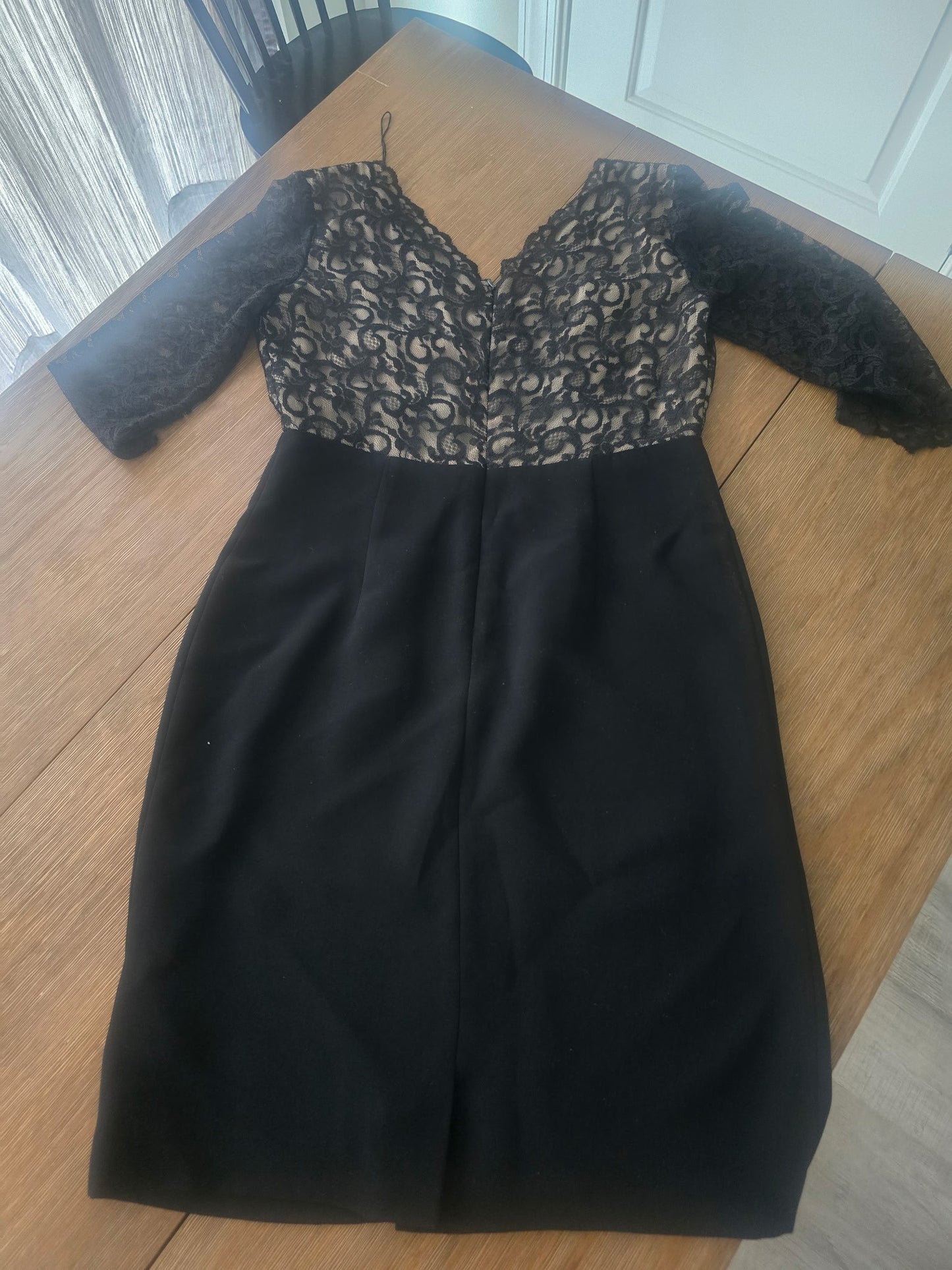 Maggy London cocktail dress black floral lace with three-quarter sleeves.