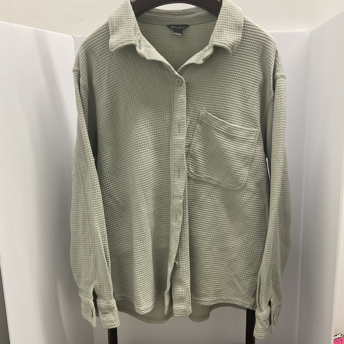 Eddie Bauer women's waffle knit button-down shirt in a light sage green color.