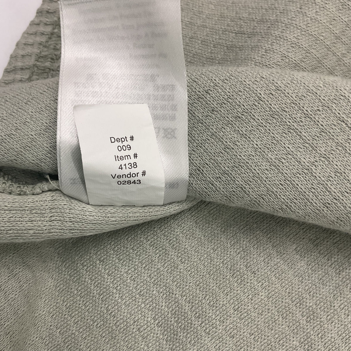Eddie Bauer women's waffle knit button-down shirt in a light sage green color.