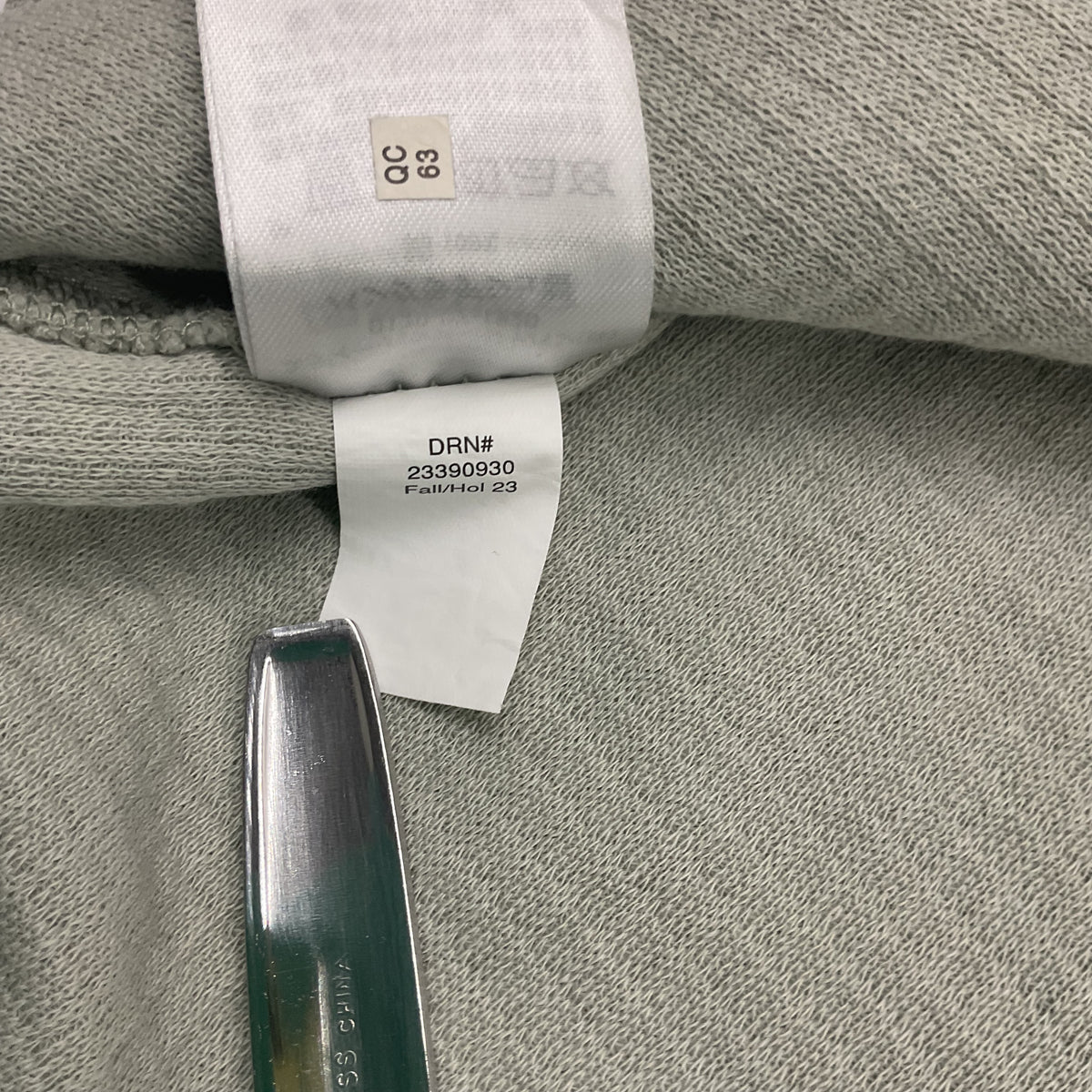 Eddie Bauer women's waffle knit button-down shirt in a light sage green color.