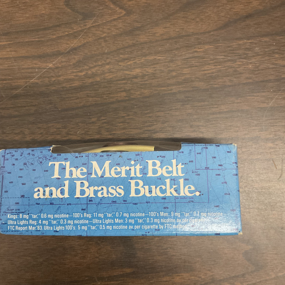 vintage Merit Cigarettes promotional brass belt buckle and webbed belt