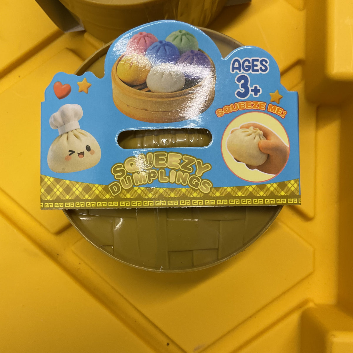 Squeezy Dumpling Fidget Toy – Soft Squishy Stress Relief Bun with Mini Bamboo-Style Steamer Container