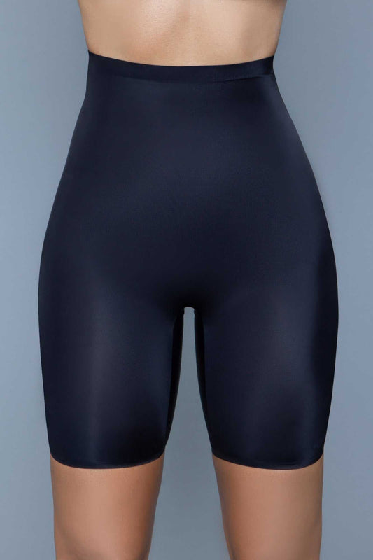 Black high-waisted seamless Think Thin Shapewear shorts smoothing midsection, hips, and thighs with breathable fabric and mid-thigh length