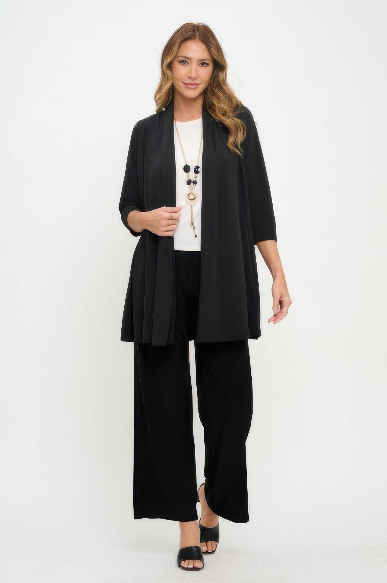 Black Venechia Pleated Princess Jacket with quarter sleeves and draped pleated design on female model