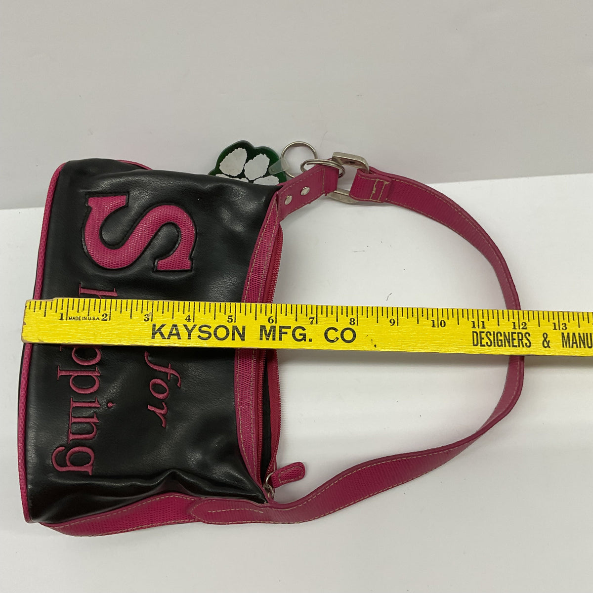 Garage Sale Unlimited black and pink shoulder handbag with S is for Shopping graphic and CHS Wolves paw print charm