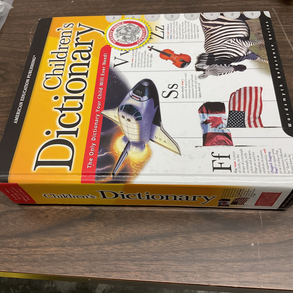 Garage Sale Unlimited American Education Publishing children's dictionary with colorful illustrations on the cover