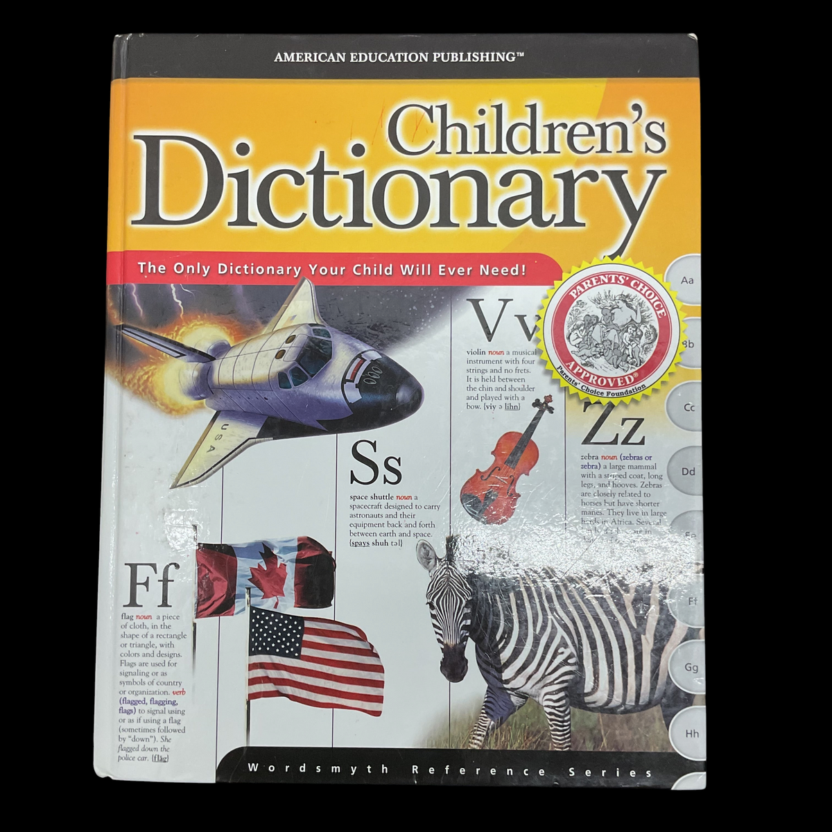 Garage Sale Unlimited American Education Publishing Children's Dictionary with colorful space and animal illustrations.