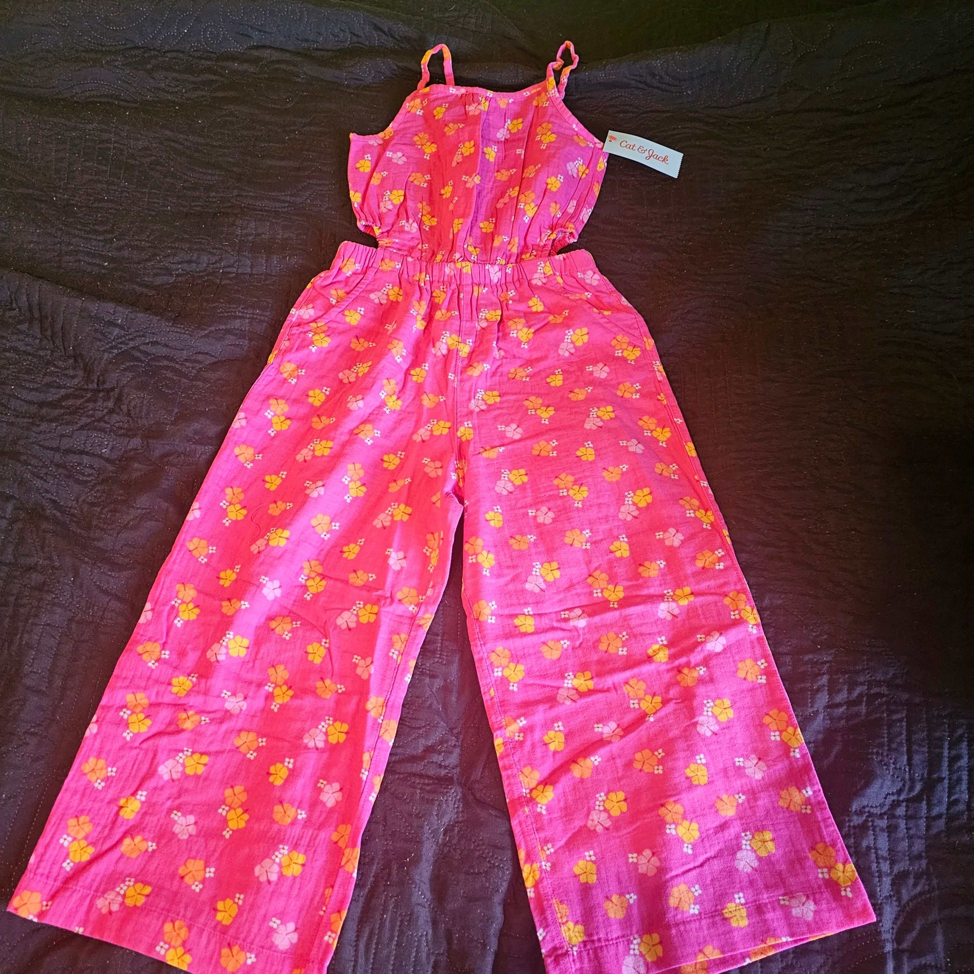 Cat And Jack pink multi floral romper for girls with spaghetti straps and wide legs