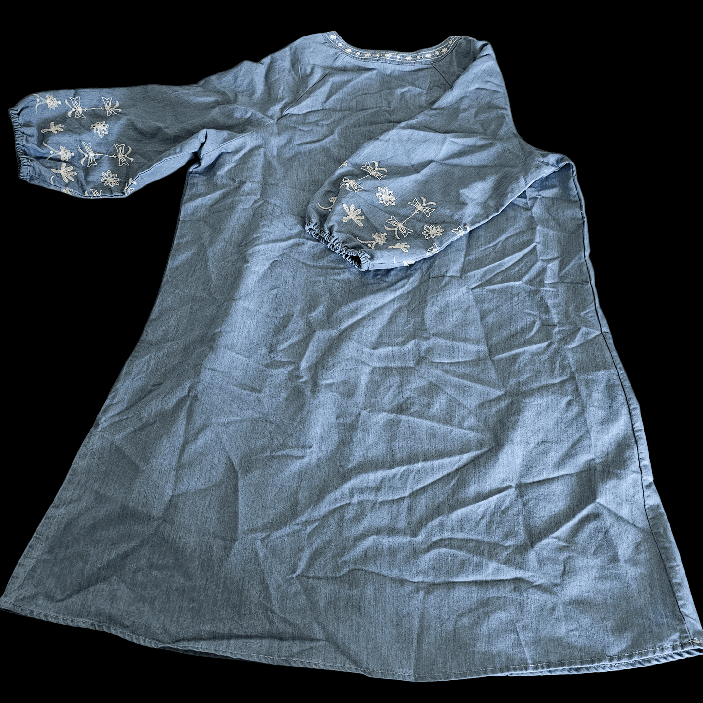 Blue embroidered denim tunic dress with floral designs on puff sleeves and loose fit